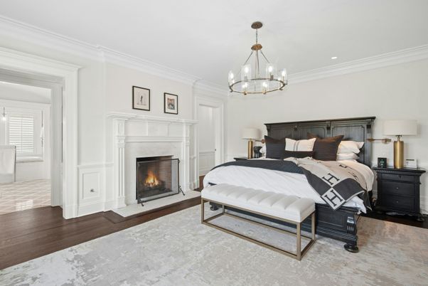Bedroom, Chandelier, Fireplace, Interior, Recessed Lighting, Wood Texture Flooring