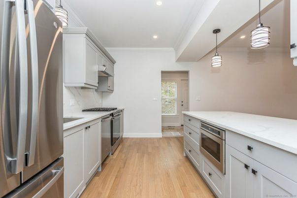 Interior, Kitchen, Pendant Lights, Recessed Lighting, Stainless Steel Appliances, Wood Texture Flooring