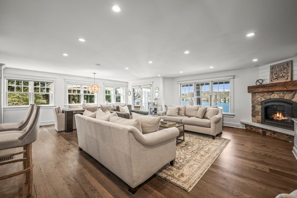 Dining room, Fireplace, Interior, Living room, Pendant Lights, Recessed Lighting, Wood Texture Flooring