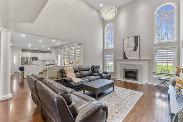 Chandelier, Fireplace, Interior, Kitchen, Living room, Pendant Lights, Recessed Lighting, Wood Texture Flooring