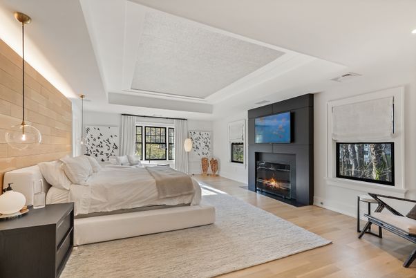 Bedroom, Fireplace, Interior, Pendant Lights, Recessed Lighting, Wood Texture Flooring