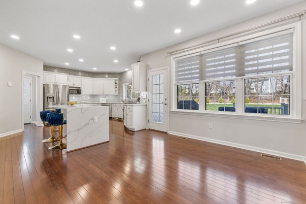 Interior, Kitchen, Marble Walls, Recessed Lighting, Stainless Steel Appliances, Wood Texture Flooring
