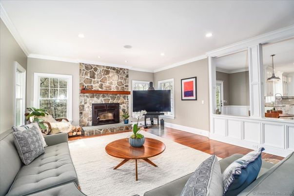 Fireplace, Interior, Living room, Pendant Lights, Recessed Lighting, Stone Walls, Wood Texture Flooring