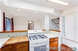 Interior, Kitchen, Recessed Lighting, Tile Countertops, Wood Texture Flooring