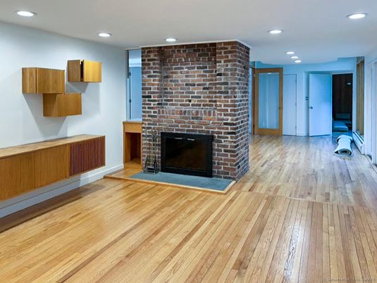Fireplace, Interior, Recessed Lighting, Stone Walls, Wood Texture Flooring