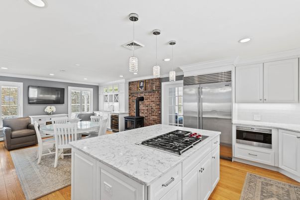 Dining room, Interior, Kitchen, Pendant Lights, Recessed Lighting, Stainless Steel Appliances, Stone Walls, Wood Texture Flooring