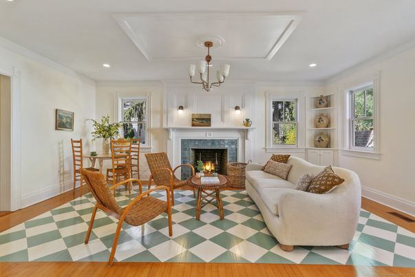 Chandelier, Dining room, Fireplace, Interior, Living room, Recessed Lighting, Wood Texture Flooring