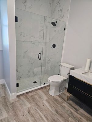 Bathroom, Glass Shower, Interior, Marble Walls, Wood Texture Flooring