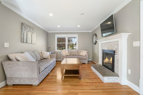Fireplace, Interior, Living room, Recessed Lighting, Wood Texture Flooring