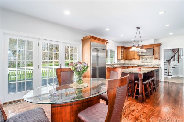 Dining room, Interior, Kitchen, Pendant Lights, Recessed Lighting, Stainless Steel Appliances, Wood Texture Flooring