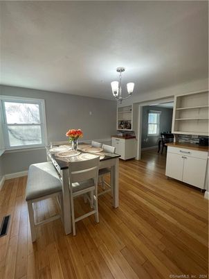 Chandelier, Dining room, Interior, Wood Texture Flooring