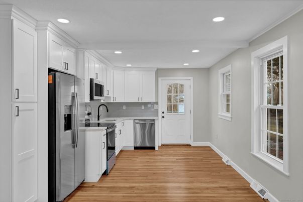 Interior, Kitchen, Recessed Lighting, Stainless Steel Appliances, Wood Texture Flooring