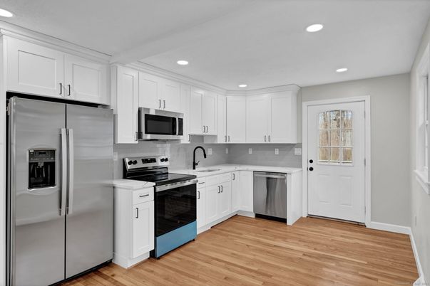 Interior, Kitchen, Recessed Lighting, Stainless Steel Appliances, Wood Texture Flooring
