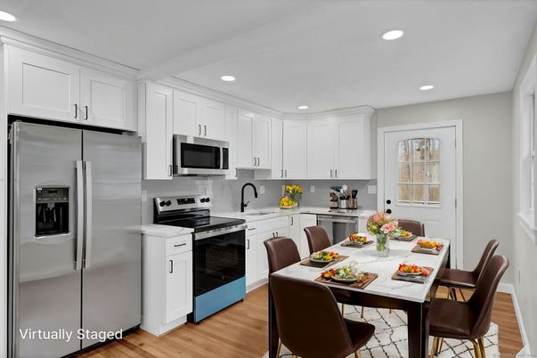Dining room, Interior, Kitchen, Recessed Lighting, Stainless Steel Appliances, Wood Texture Flooring