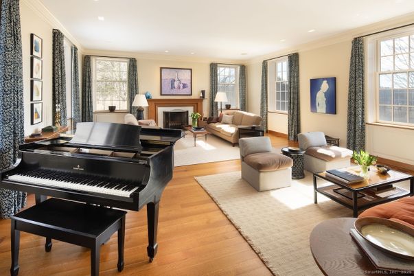 Fireplace, Interior, Living room, Piano, Recessed Lighting, Wood Texture Flooring
