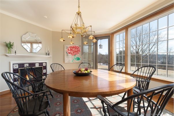 Dining room, Fireplace, Interior, Pendant Lights, Wood Texture Flooring