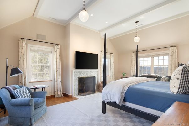 Bedroom, Fireplace, Interior, Pendant Lights, Recessed Lighting, Wood Texture Flooring