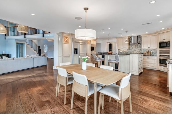 Dining room, Interior, Kitchen, Living room, Pendant Lights, Recessed Lighting, Stainless Steel Appliances, Wood Texture Flooring
