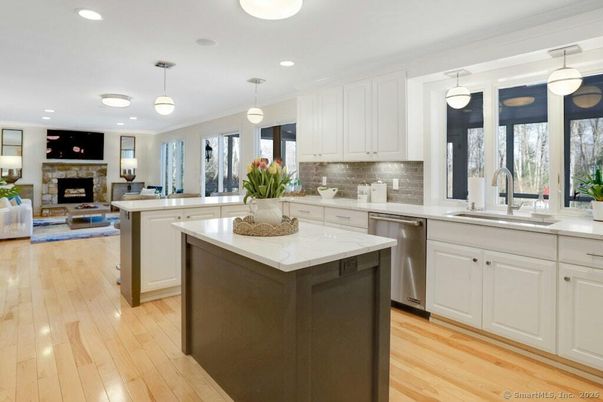 Fireplace, Interior, Kitchen, Living room, Pendant Lights, Recessed Lighting, Stainless Steel Appliances, Wood Texture Flooring