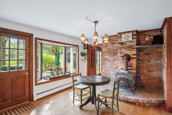 Chandelier, Fireplace, Interior, Stone Walls, Wood Texture Flooring