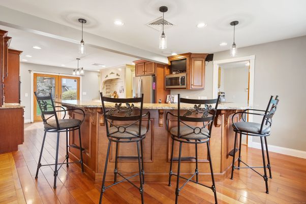 Dining room, Interior, Kitchen, Pendant Lights, Recessed Lighting, Stainless Steel Appliances, Wood Texture Flooring