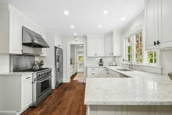 Interior, Kitchen, Recessed Lighting, Stainless Steel Appliances, Wood Texture Flooring