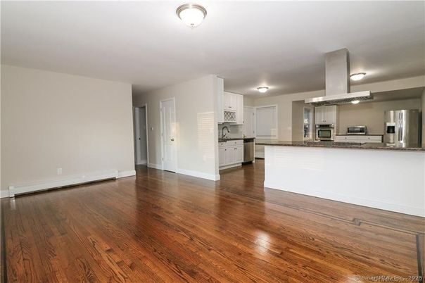 Empty room, Interior, Kitchen, Stainless Steel Appliances, Wood Texture Flooring