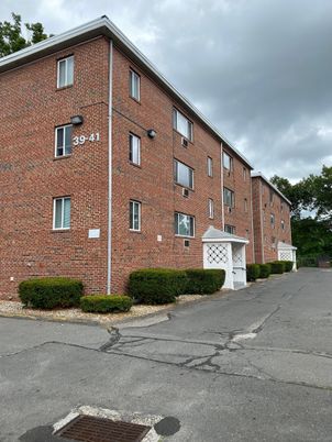 Attached, Exterior, Facade, Brick Facade, Condo Building