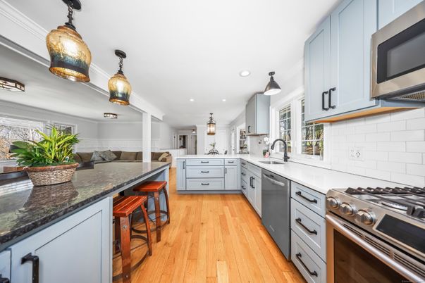 Interior, Kitchen, Pendant Lights, Recessed Lighting, Stainless Steel Appliances, Wood Texture Flooring