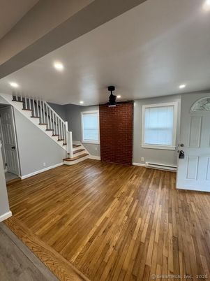 Empty room, Interior, Recessed Lighting, Stone Walls, Wood Texture Flooring