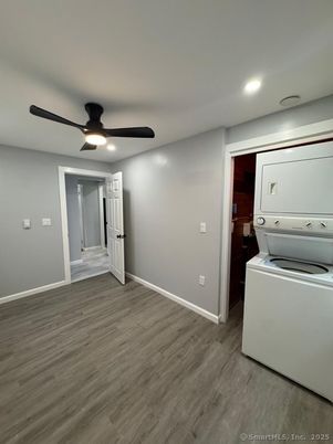Empty room, Interior, Recessed Lighting, Utility Closets, Washer, Wood Texture Flooring