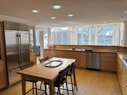 Dining room, Interior, Kitchen, Recessed Lighting, Stainless Steel Appliances, Wood Texture Flooring