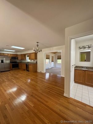 Chandelier, Empty room, Interior, Kitchen, Stainless Steel Appliances, Wood Texture Flooring