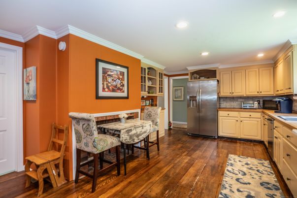Dining room, Interior, Kitchen, Recessed Lighting, Stainless Steel Appliances, Wood Texture Flooring