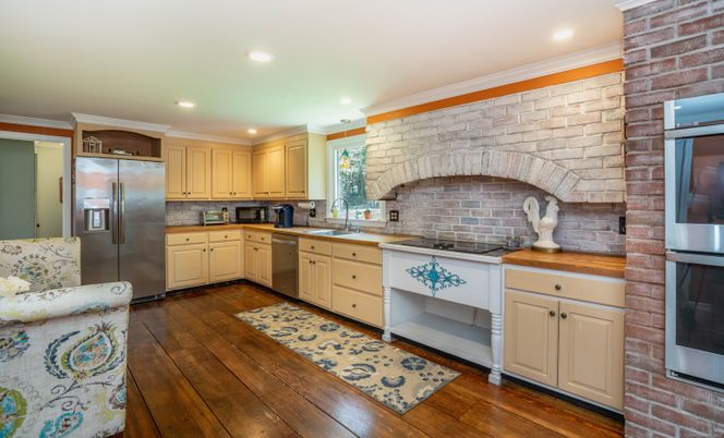 Interior, Kitchen, Recessed Lighting, Stainless Steel Appliances, Stone Walls, Wood Texture Flooring