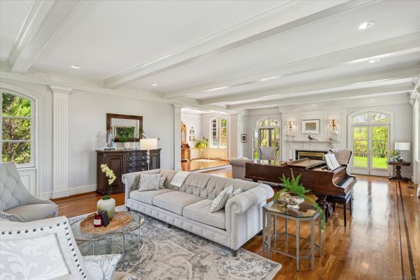 Fireplace, Interior, Living room, Piano, Recessed Lighting, Wood Texture Flooring