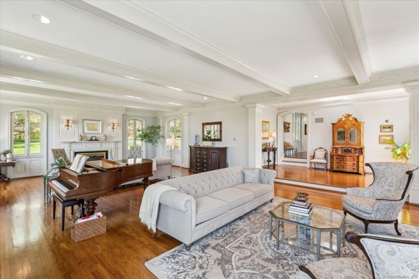 Fireplace, Interior, Living room, Piano, Recessed Lighting, Wood Texture Flooring