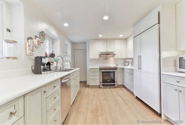 Interior, Kitchen, Recessed Lighting, Stainless Steel Appliances, Wood Texture Flooring