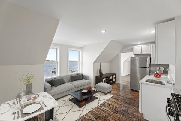 Dining room, Interior, Kitchen, Living room, Recessed Lighting, Stainless Steel Appliances, Water, Wood Texture Flooring
