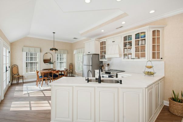 Dining room, Interior, Kitchen, Pendant Lights, Recessed Lighting, Stainless Steel Appliances, Wood Texture Flooring