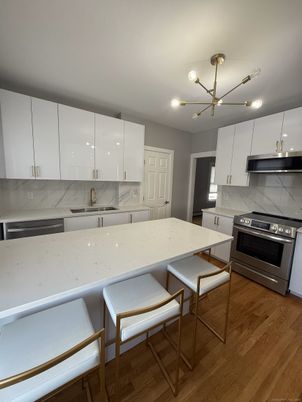Interior, Kitchen, Pendant Lights, Stainless Steel Appliances, Wood Texture Flooring