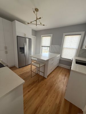 Interior, Kitchen, Pendant Lights, Stainless Steel Appliances, Wood Texture Flooring