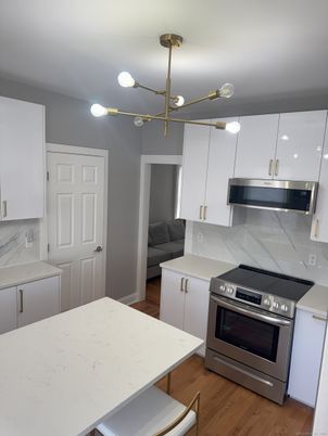 Interior, Kitchen, Pendant Lights, Stainless Steel Appliances, Wood Texture Flooring