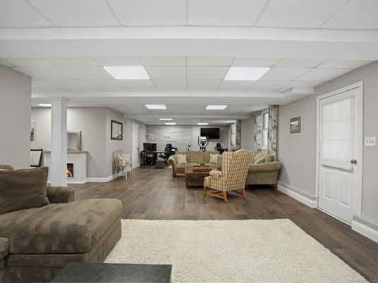 Dining room, Fireplace, Interior, Living room, Recessed Lighting, Wood Texture Flooring