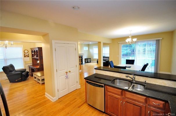 Chandelier, Dining room, Interior, Kitchen, Living room, Recessed Lighting, Wood Texture Flooring