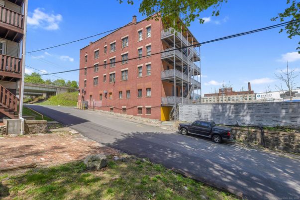 Exterior, Facade, Brick Facade, Condo Building