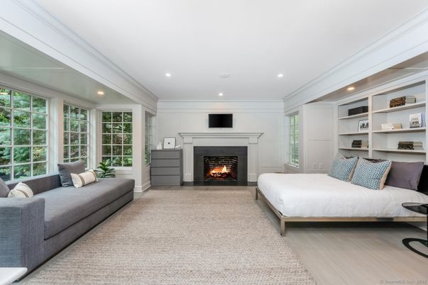 Bedroom, Fireplace, Interior, Recessed Lighting, Wood Texture Flooring