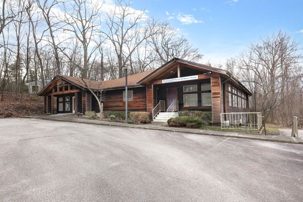Exterior, Facade, Brick Facade, Log Home
