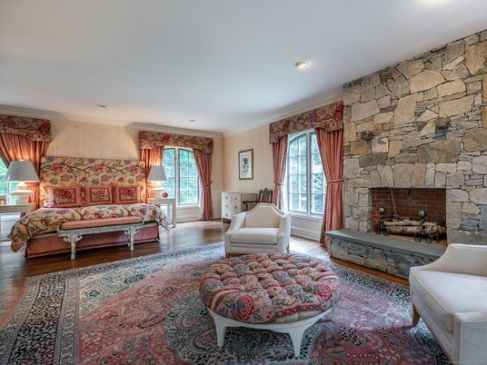 Fireplace, Interior, Living room, Recessed Lighting, Stone Walls, Wood Texture Flooring