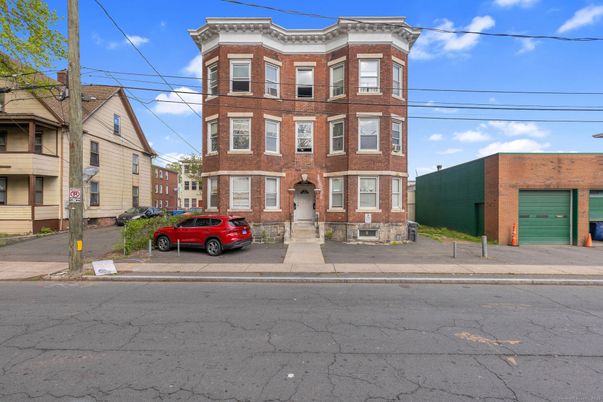 Exterior, Facade, Brick Facade, Rowhouse